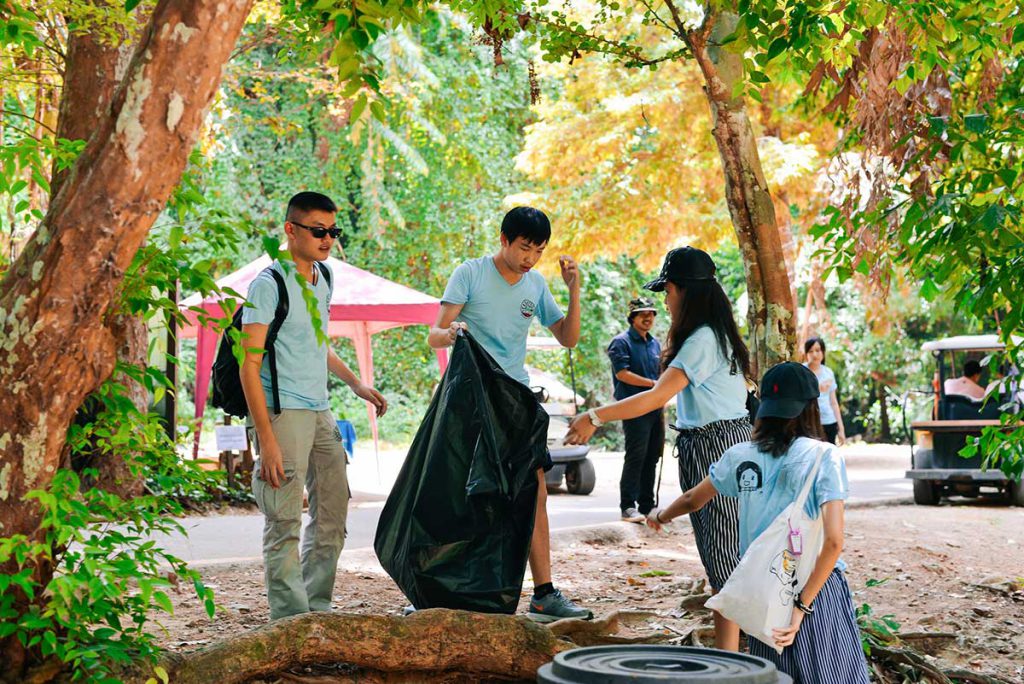 Students cleaning up trash